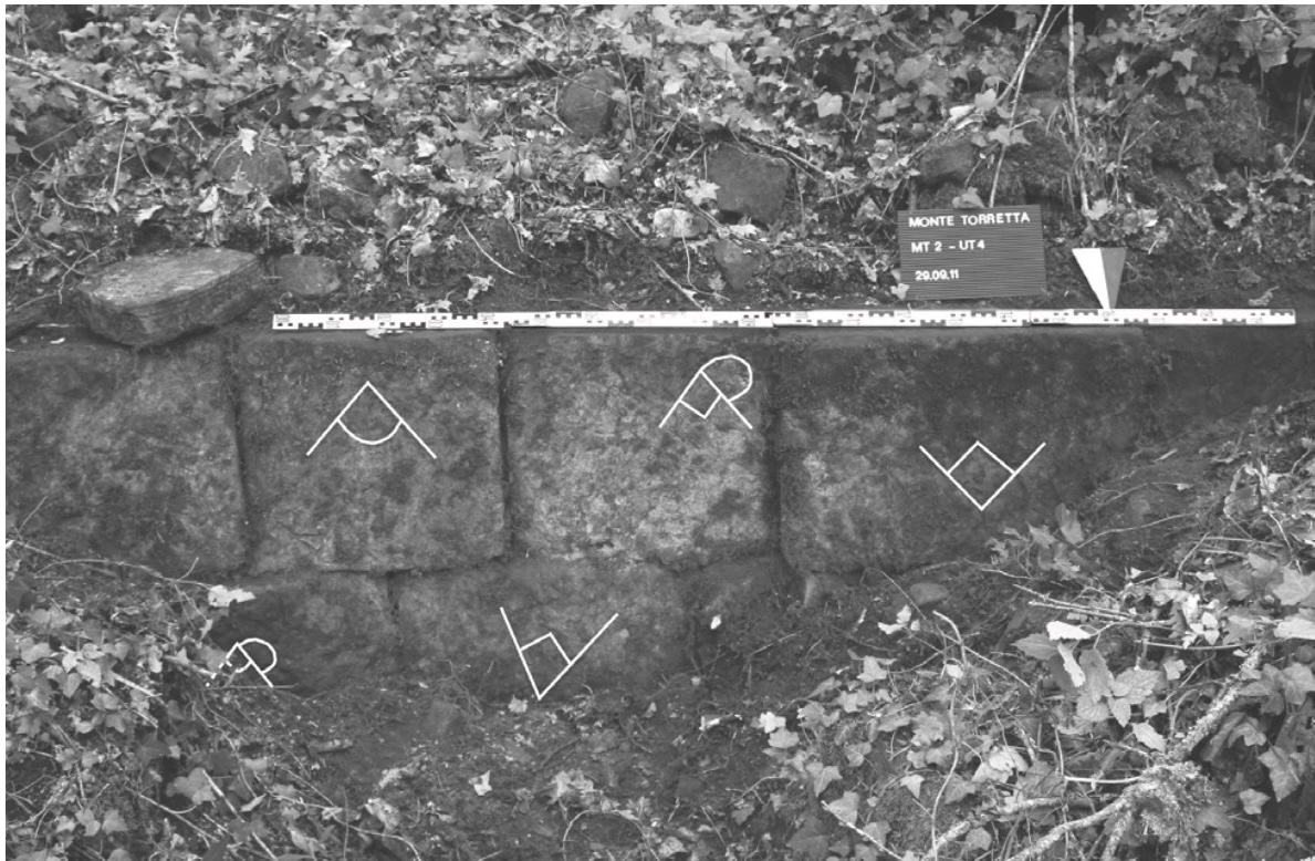 Greek letters incised on blocks